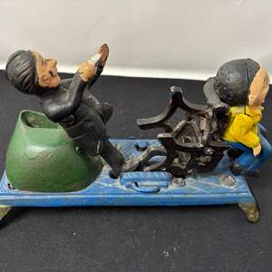 Lot #91 - Cast Iron Mechanical Bank - 'Penny Bank' - 1920s.