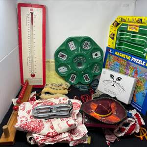 Lot #146 - Vintage Collectibles Lot - Games, Kitchenware, and Maps.