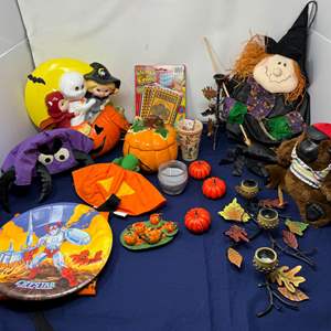 Lot #224 - Seasonal and Fun Collectibles Lot - Halloween Decor, Dolls, and More.