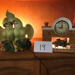 Lot # 19 - Lighted Oxford self starting fireplace clock (not working). Vintage Cockateil lamp/light