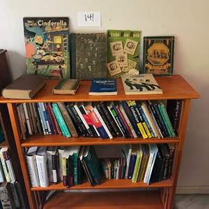 Lot # 141 - Bookshelf with books, 37.5x12.5x39hi. Collapsible