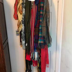 Lot # 143 - Hanging scarf rack with multiple scarves