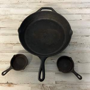 Lot #154.5 Lodge Cast Iron Skillet lot 12” Skillet and 2 3.5” Egg Skillets 