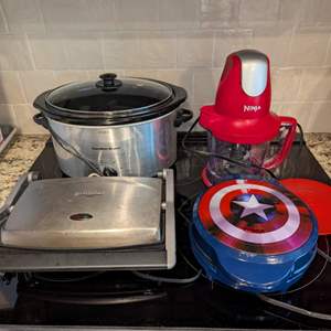 Lot #17 -  Kitchen Appliance Lot - Hamilton Beach Slow Cooker, Ninja Chopper, Griddler Panini Press, and Captain America Waffle Maker.