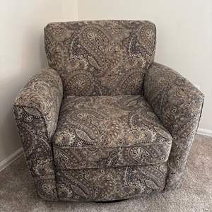 Lot #70 -  Best Home Furnishings Swivel Glider Chair - Paisley Pattern