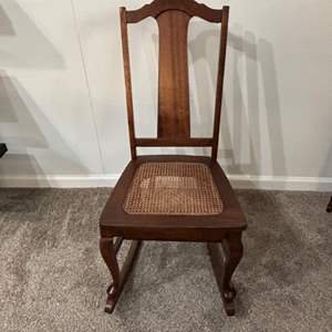 Lot #84 -  Antique Rocking Chair - Wooden Cane Seat.