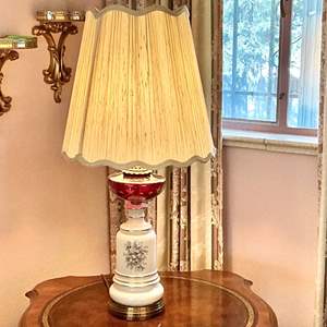 Lot #119 -   Antique Oil Lamp - Cranberry Glass and Porcelain Base Table Lamp.