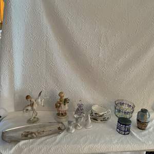 Lot #91 -   Large Collection of Decorative Items - Porcelain Figurines, Glassware, and More.