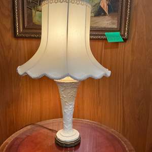 Lot #109 -   Vintage Creme Porcelain Lamp with Silk Shade and Intricate Brass Base.