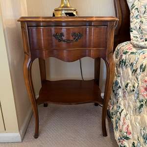 Lot #91 -  Sample title Vintage Nightstand - Elegant Design with Drawer and Shelf.