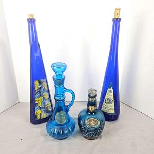 Lot #533 - Blue Glass Collectible Liquor Bottles Lot - Jim Beam Decanter, Chivas Scotland & More