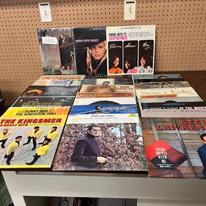 Lot #591 -  Vintage Vinyl Records Lot - 1960s & 1970s Collection including Nancy Sinatra, Johnny Mathis, The Platters, and more.