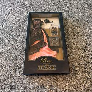 Lot #422 The Offical Rose Vinyl Portrait Doll Wardrobe Collection - Titanic