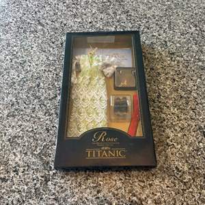 Lot #424 The Offical Rose Vinyl Portrait Doll Wardrobe Collection - Titanic