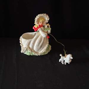 Lot #65 Vintage Porcelain Christmas Shopper Girl Planter w/ Poodle