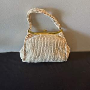 Lot #203 Lumured Corde-Bead White Beaded Handbag