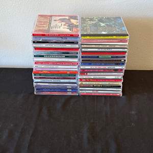 Lot #562 Collection of CDs - The Beach Boys, Billy Idol, John Mellencamp & More