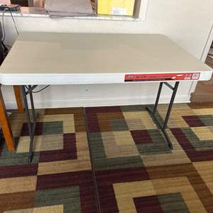 Lot #668 Lifetime 48in. x 30in. Commercial Folding Table