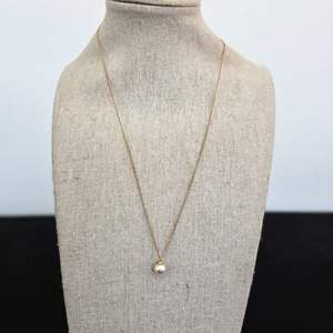 Lot #829 14k Gold Necklace w/ Faux Pearl Charm - TW is 2.36g