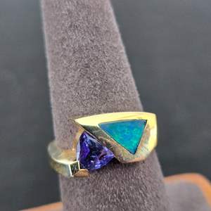 Lot #837 14k Gold Ring w/ Fire Opal & Tanzanite? - TW is 8.36g - Size 7 - See Description 