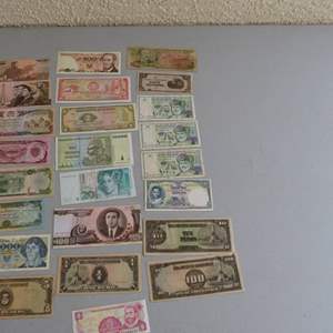 Lot #206 Large lot Foreign Notes Bills (to include North Korea) (in case you're planning on vacationing there in the near future