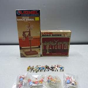 Lot #23 Mixed Lot Lionel Banjo Signal, Road Signs, and Tiny People As Shown