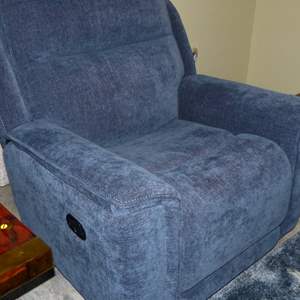 Lot #359  Great overstuffed blue recliner (not electric) read below