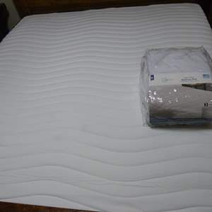 Lot #194 King Size Mattress, Box Spring, and Mattress Pad As Shown