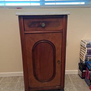 Lot #16 - Marble? top cabinet 32 1/2" tall crack on top