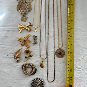 Lot #63 - 3 necklaces, MCM owl pendant, 6 pins, 1 chick charm, 1 bracelet, costume 