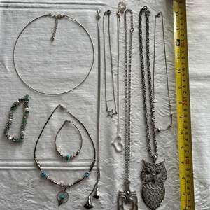 Lot #67 - 8 silver-tone necklaces, 2 beaded bracelets