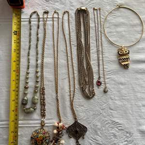 Lot #69 - 8 gold-tone necklaces