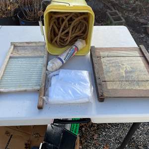 Lot #397 - Glass washboard, rope, small grape tray rattle snake art, white zipper bag