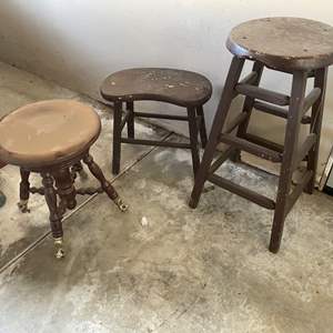 Lot #413 - 2 wood stools & a wood piano stool (needs screws)