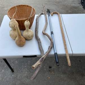 Lot #441 - Wicker basket, gourds, cane, walking sticks