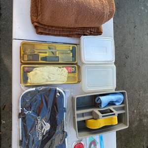 Lot #458 - 2 Gun cleaning kits, chukchansi mini table bag/cooler, plastic boxes, protractor reflector