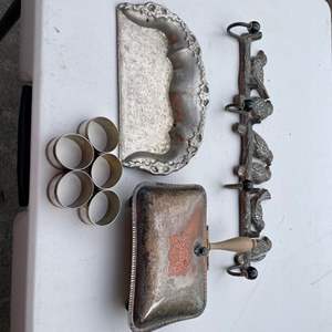 Lot #471 - Metal Bird rack, silver plate crumb catcher, plate butler's tray, napkin rings