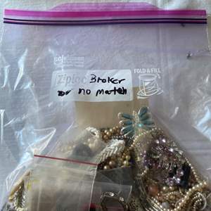 Lot #87 - A lot of broken parts and 5 costume necklaces