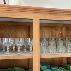 Lot #128 - Shelf of clear glassware approximately 35 items as pictured does not include anything but the clear glassware