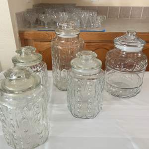 Lot #138 - 4 matching Clear vintage cannisters