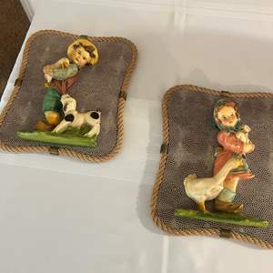 Lot #141 - Pair of boy & girl figures wall hangings