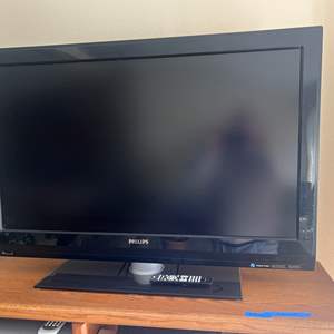 Lot #177 - Phillips 42" TV with remote turns on