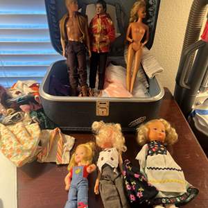 Lot #212 - 1966 Barbie, 1968 Ken + clothes and suitcase as well as 5 other vintage dolls and Michael Jackson