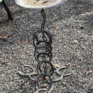 Lot #308 - Horseshoe / disc bird bath / plant stand