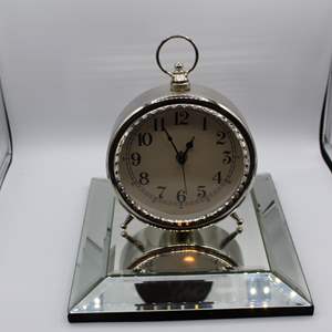 Lot #149 Lot of 2 Items- Mirror Wall Hanging + Large Alarm Clock