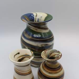 Lot #558 Trio of Swirled Pottery Vases