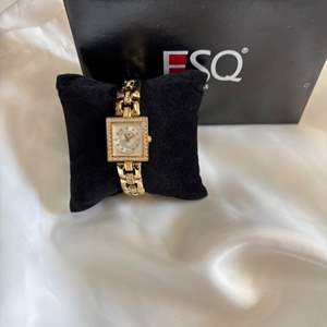 IP Lot #83  ESQ Swiss Gold Tone Women's Watch - Elegant Design.