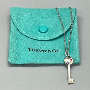 Lot # 78 - Tiffany & Co Sterling Silver Key to my Heart With Ruby