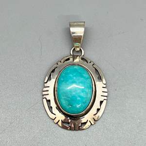 Lot # 109 - Sterling silver and turquoise pendant (7.3gtw)