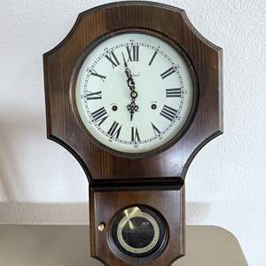 Lot #280 - Centurion Wall Clock With Key